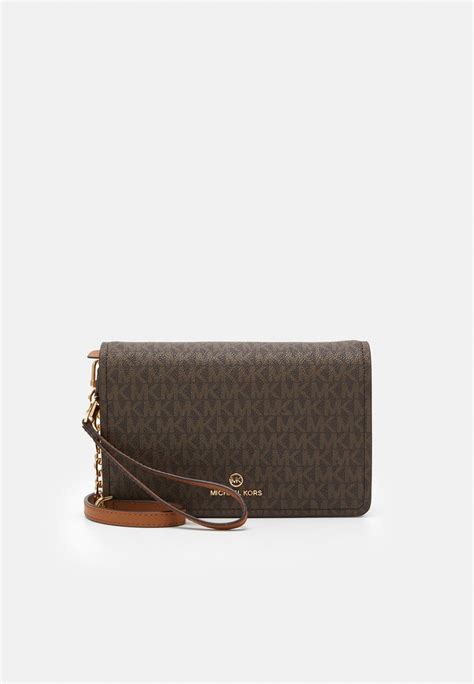 mala crna torba michael kors|michael kors flap xbody.